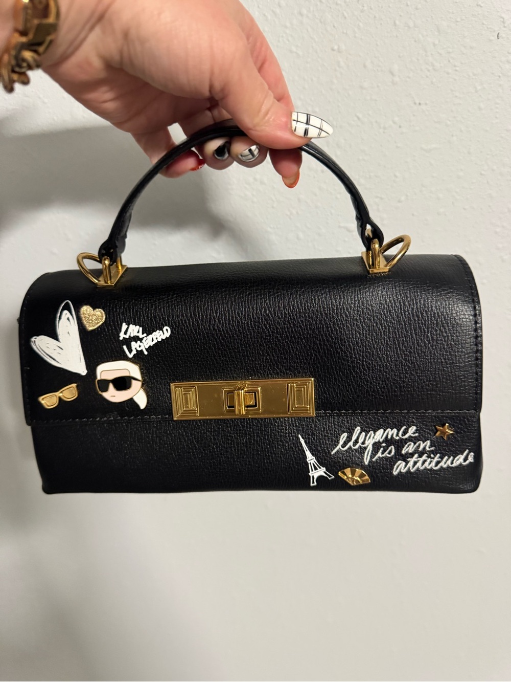 Karl Lagerfeld Black Top-Handle Satchel with Gold Hardware and Graphic Accents